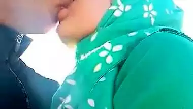 Cute Bangladeshi couple outdoor romance