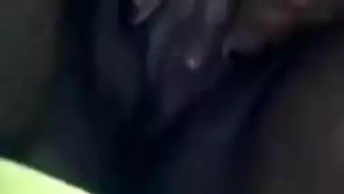 Desi chick in a colorful sari exposes tits and rubs XXX nipples