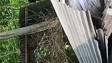 Village neighbor girl outdoor bath caught through hole