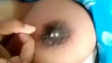 Desi Bhabhi's milking tits exposed in the close-up self-made XXX video