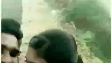 Sweet Tamil girl giving blowjob outdoors