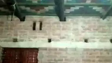 Village girl applying lotion to full nude body