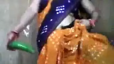 Smiling Indian bhabi tries out something new