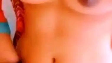 Desi wife shows off small breasts and hairy cunt in online XXX show