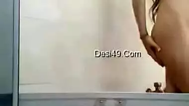 Desi teen gets naked on camera but never opens face hidden under fabric