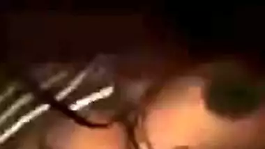Indian MILF exposes succulent XXX boobies in the dark of the bedroom