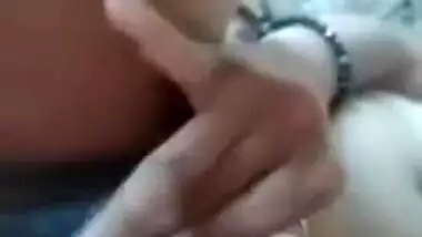 Indian babe with wonderful hair sucks fingers and rubs XXX slit